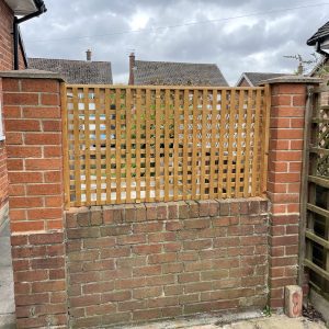 Trellis Between Brick Pillars